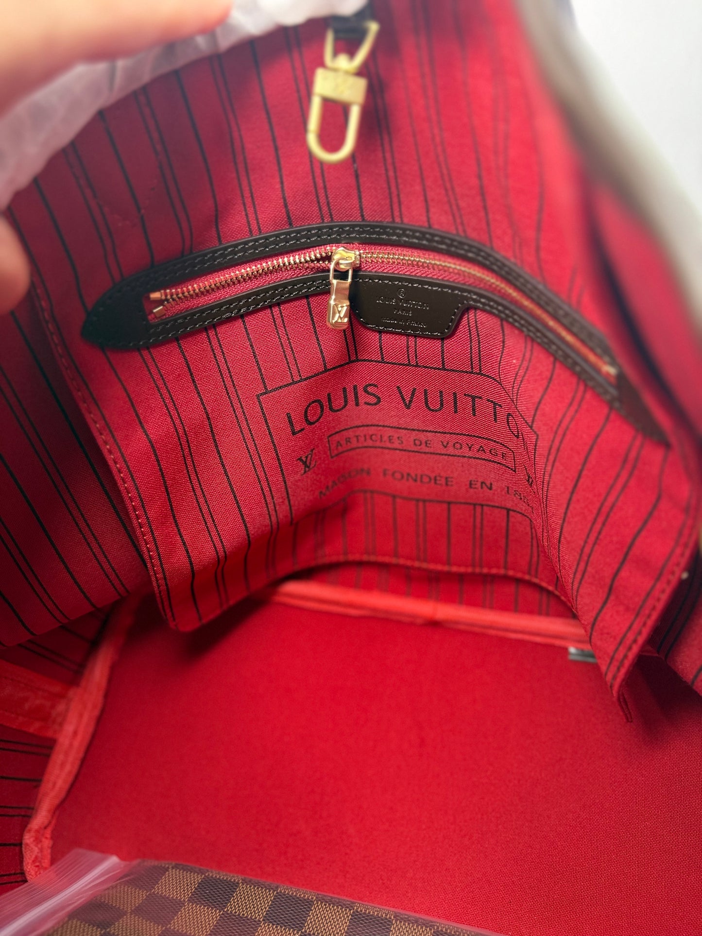 NEVER DAMIER PIEL